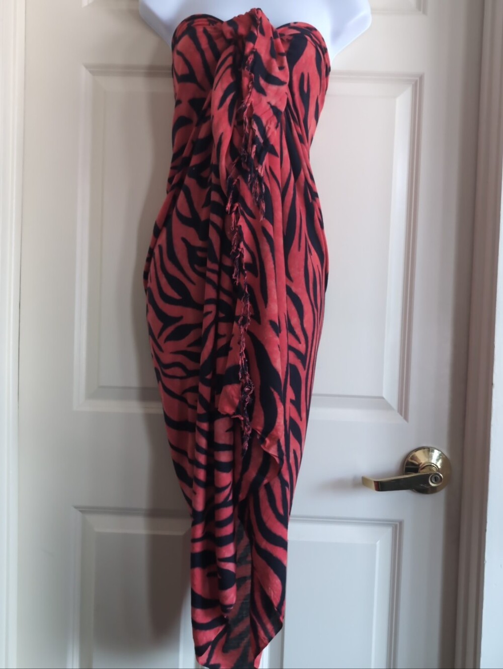 Red and black zebra or tiger print sarong with fringe